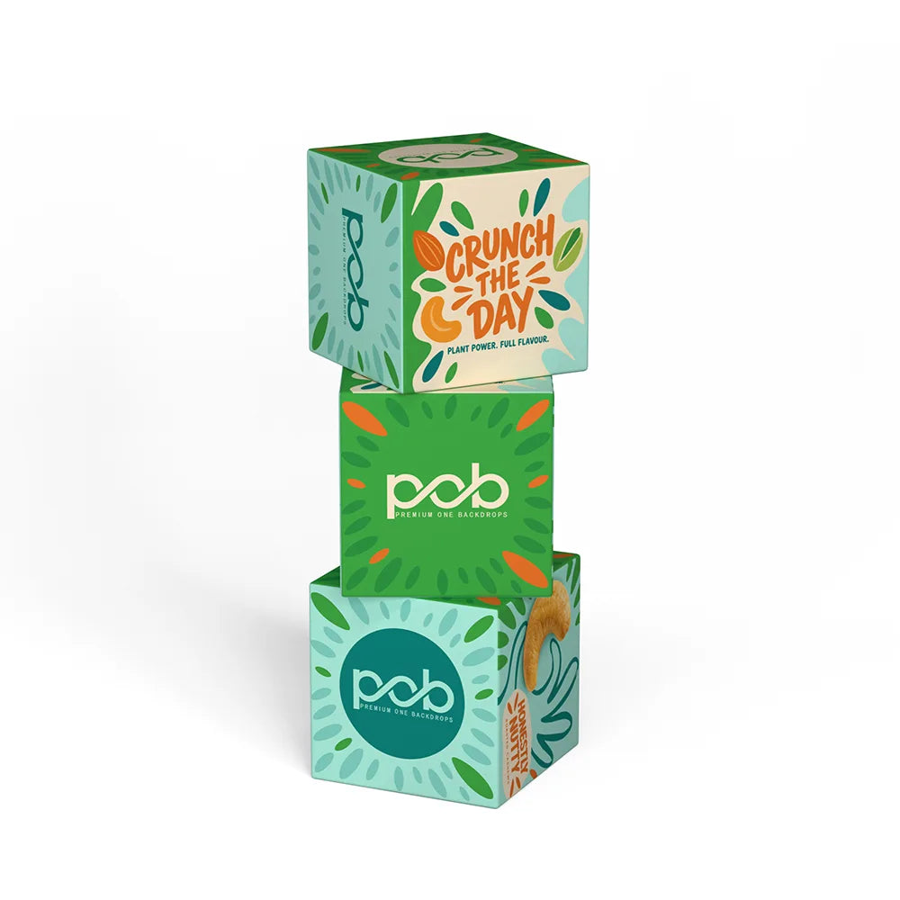 Three stacked 3D display cubes featuring different branded graphics on each side