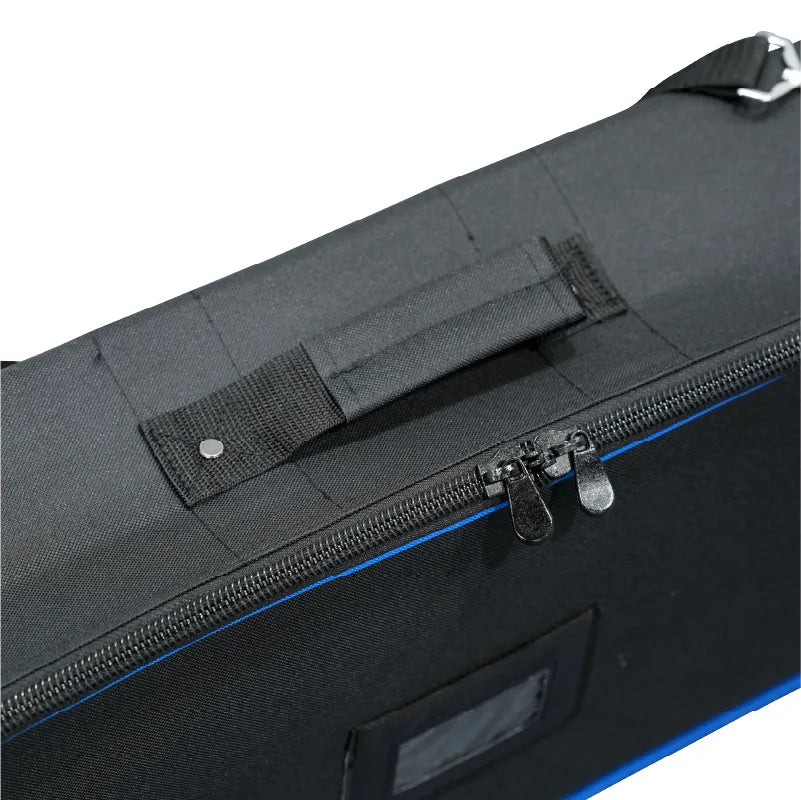 Close-up of the carrying handle, double zipper pulls and label window on a black hard case