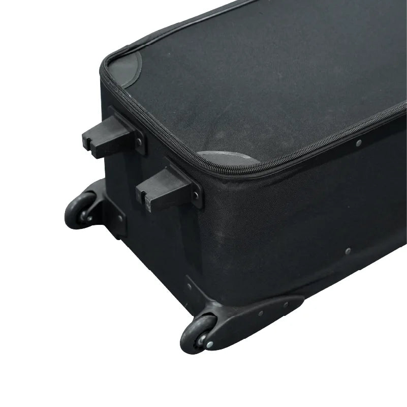 Close-up of the wheels, support feet and protective corner guards on a large rolling hard case
