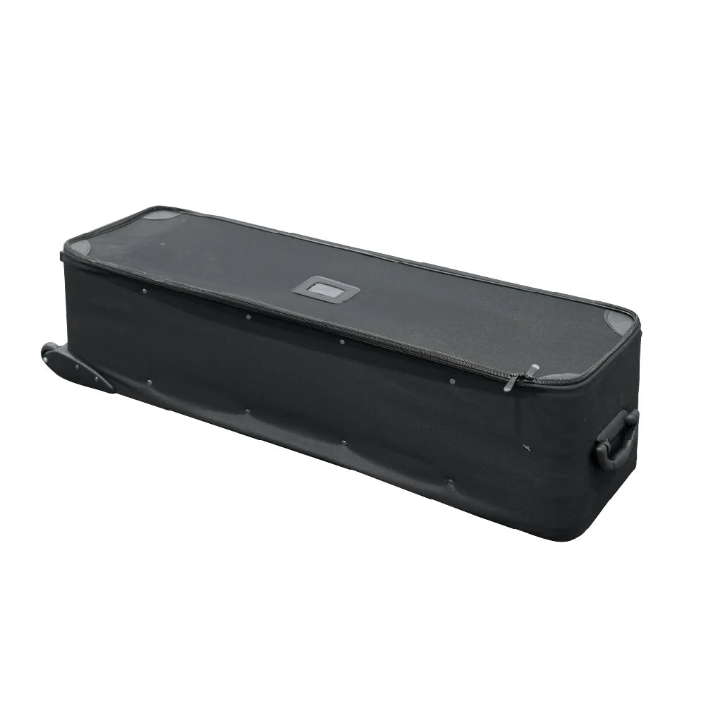Angled view of a large black hard case with wheels, reinforced edges and a side carrying handle