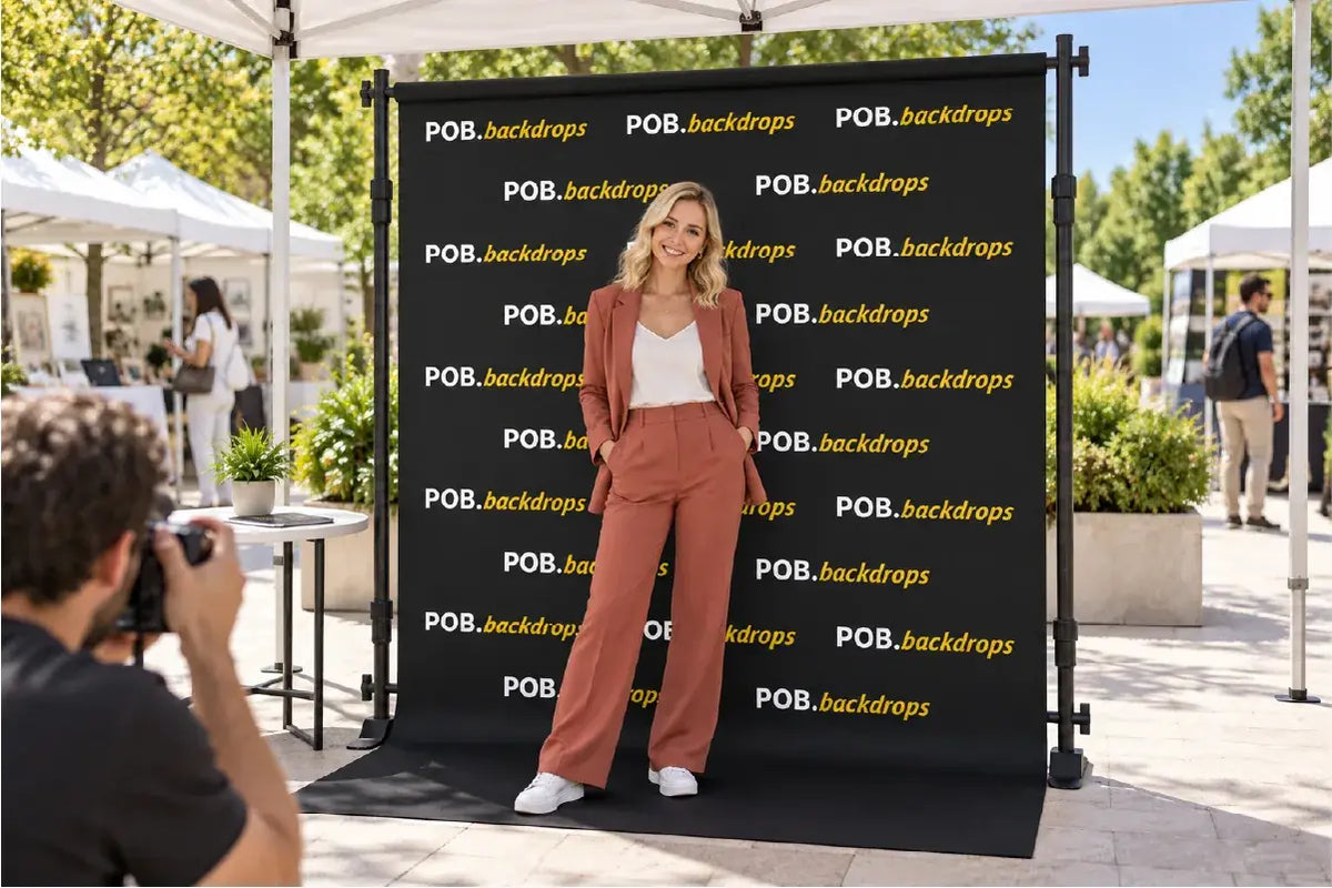 8ft step and repeat banner with top pole pocket used as an outdoor event photo backdrop