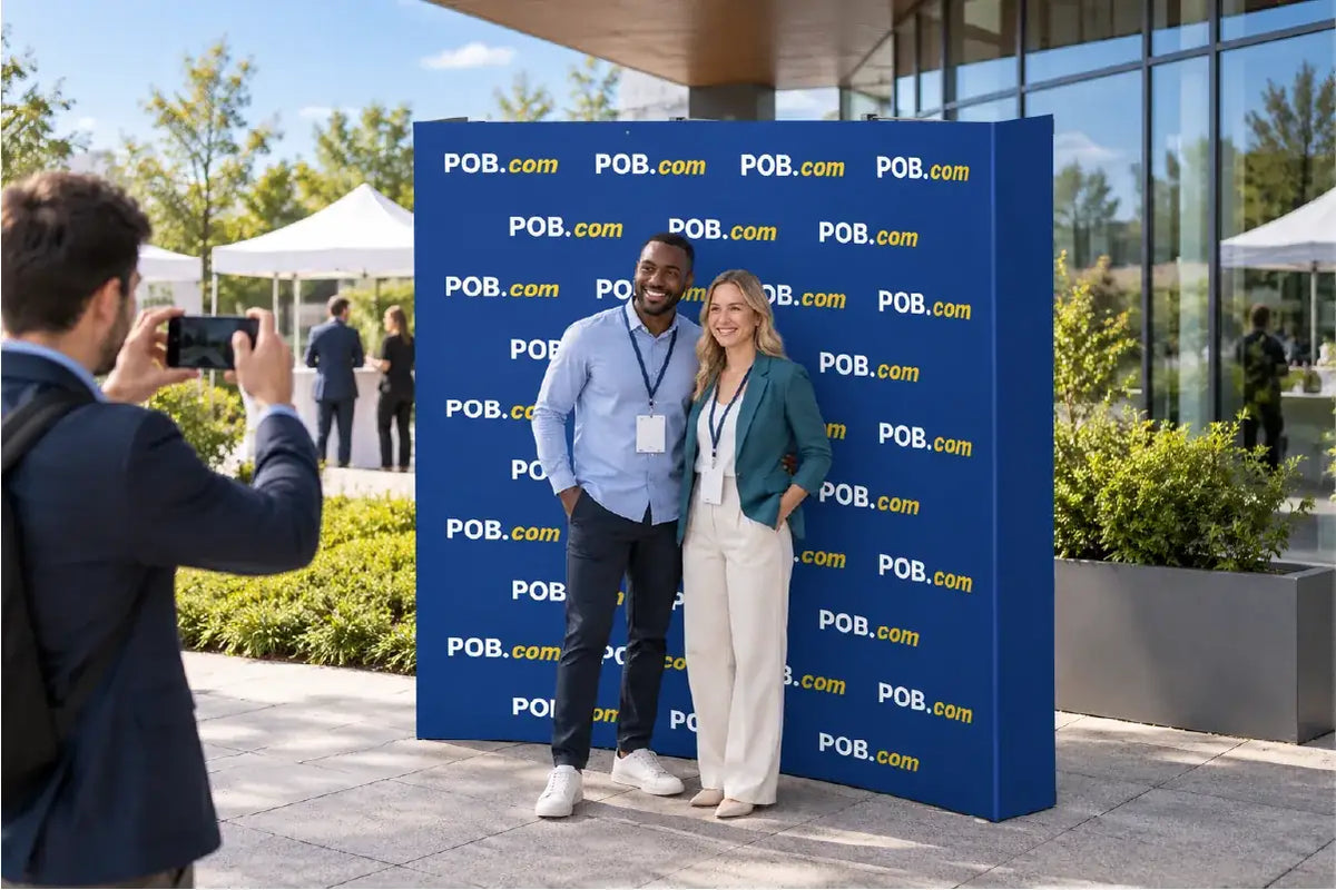 Curved pop up backdrop used for outdoor events and branded photo areas